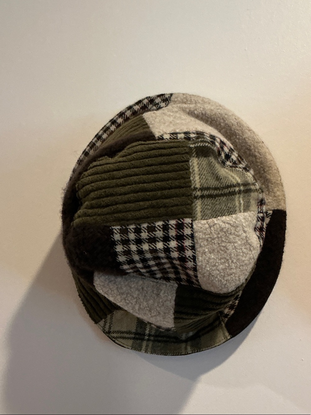 Janessa Leone Patchwork Bucket Hat in Olive Green, Cream, Black- size medium